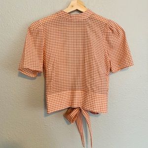 Open tie-back top